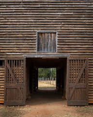 Open doors of an old wooden barn in rural Georgia
