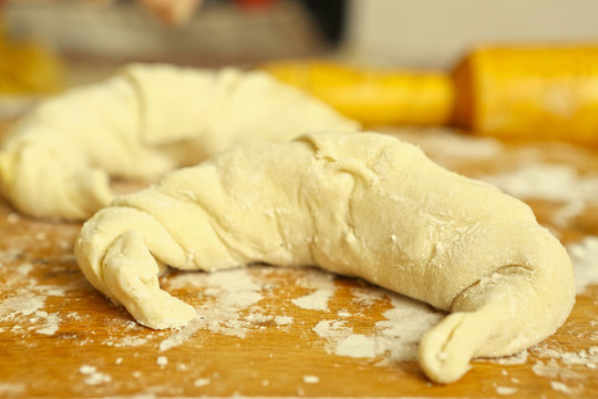 Croissant still raw on the coking board
