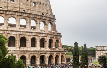 Fototapeta premium Tourists near Colosseum monument in Rome city. Italy