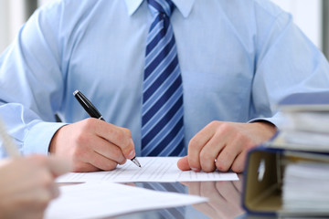 Bookkeepers or financial inspector making report, calculating or checking balance. Audit concept.