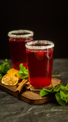 Cranberry Mojito in glasses decorated with sugar. selective Focus