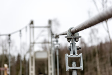 details from metal of wooden suspension footbridge over river