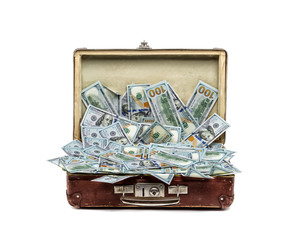 Open old vintage suitcase full of money, business concept