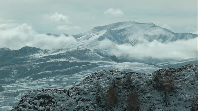 Eagles fly around in an updraft in the mountains of Dagestan