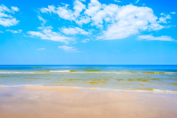 Fototapeta na wymiar Sea waves on white sand Debki beach, Baltic Sea, Poland