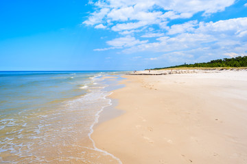 Sea waves on white sand Debki beach, Baltic Sea, Poland