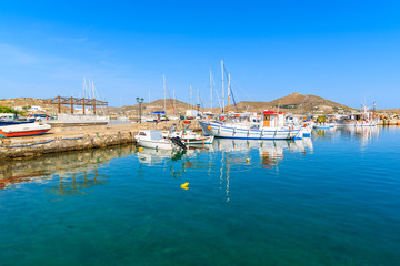 Fototapeta na wymiar View of fishing boats anchoring in Naoussa port, Paros island, Greece