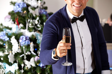 Man holding champagne at the party.