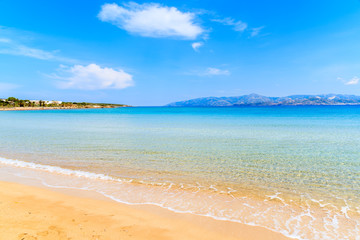 View of beautiful sandy Santa Maria beach with azure sea water on coast of Paros island, Greece
