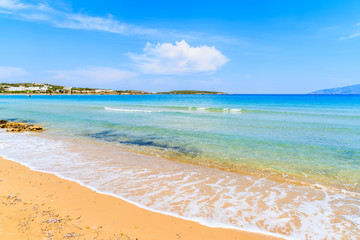 View of beautiful sandy Santa Maria beach with azure sea water on coast of Paros island, Greece
