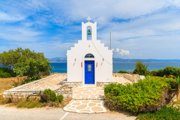 Typical Greek white church building in Ampelas fishing village, Paros island, Greece