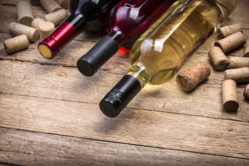 Glass bottle of wine with corks