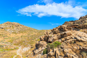 Fototapeta na wymiar Rocks on coastal path near Monastiri bay on Paros island, Greece