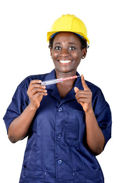 Smiling young woman showing her work tool.