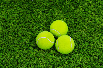 Close up of tennis ball on grass