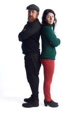 A man and woman from back to back