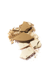 Two tone brown color Face make up powder cracked on background