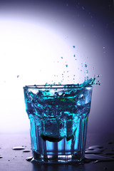Splash photography with blue liquid