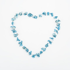 Heart on white background, Dry flowers, hydrangea. Flat lay, Top view