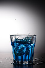 Splash photography with blue liquid
