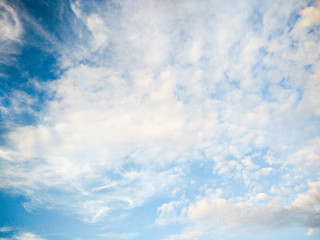 Soft focus of blue sky with clouds for texture background.