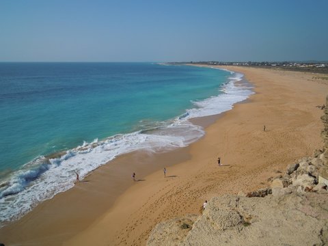 people on the Zahora&acute;s beach