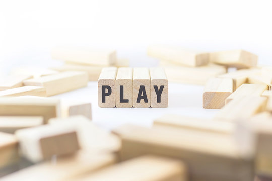 Alphabet letters on wooden pieces collected to word play with cl