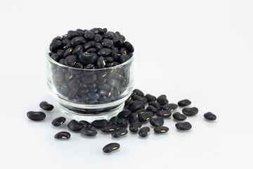 Fototapeta na wymiar glass bowl full of black small beans