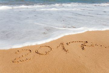 Happy New Year 2017, lettering on the beach.