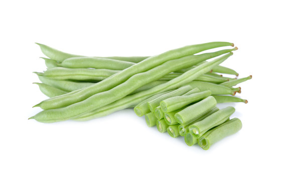 heap of French beans on white background