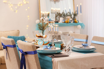 Table served for Hanukkah in living room