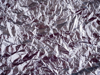 Silver foil with shiny crumpled surface