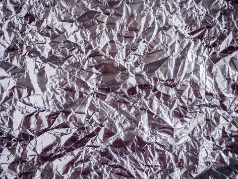 Silver foil with shiny crumpled surface
