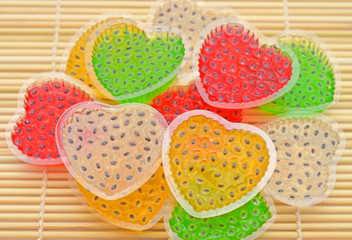 Colorful Thai dessert hearth jelly with hoary basil on  rolling