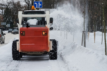 machine clears the snow