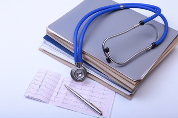 Stethoscope and medical equipment on a light blue background