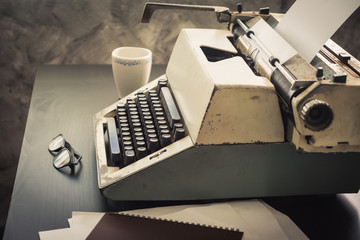 Old Typewriter on the desk. Vintage tone