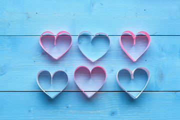 Colorful hearts and blue plank