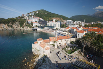 Naklejka na ściany i meble Group of tourists in Budva citadel. View from above. Montenegro