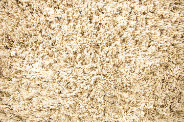 Beige carpet cloth texture for background or floor home decor.
