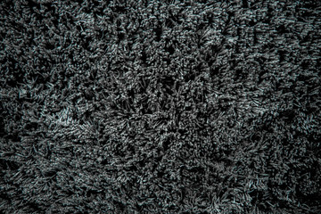 Fototapeta premium Dark grey carpet cloth texture for background or floor home decor. 