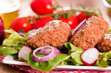 Meatballs with salad.