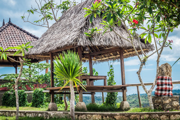 Wooden gazebo on a tropical island Bali, Indonesia.