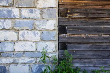 Stone wall joining the wall of beams