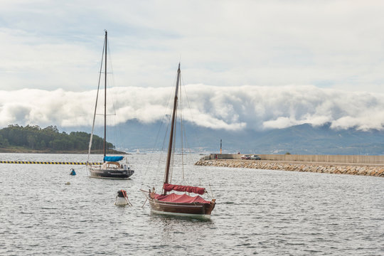 Two sailboats anchored on Xufre port