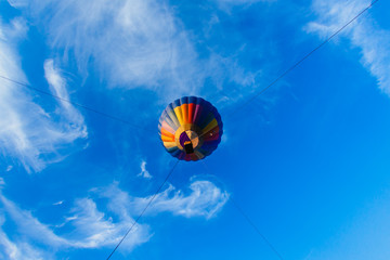 Colorful hot air balloon in blue sky