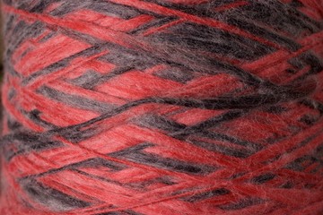 Mixed Red Black Crochet Slub Yarn Threads close-up shot background texture