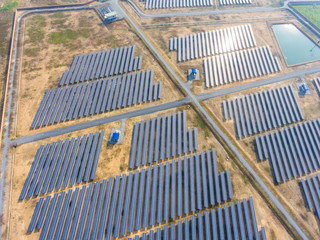 Aerial Shot of Photovoltaics Solar Farm in Rural Area, Overhead