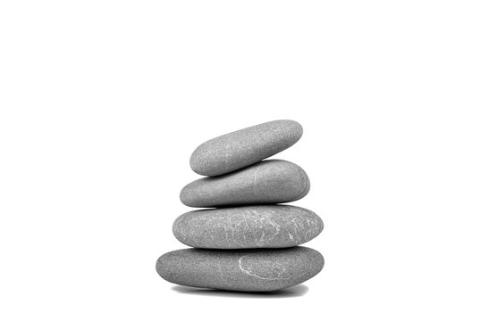 Stack of pebble stones isolated on white background with soft shadow