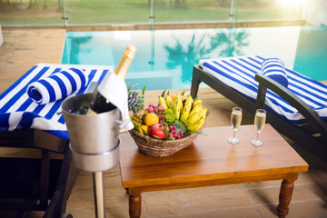 Swimming pool, relax, fruit food and sunset light